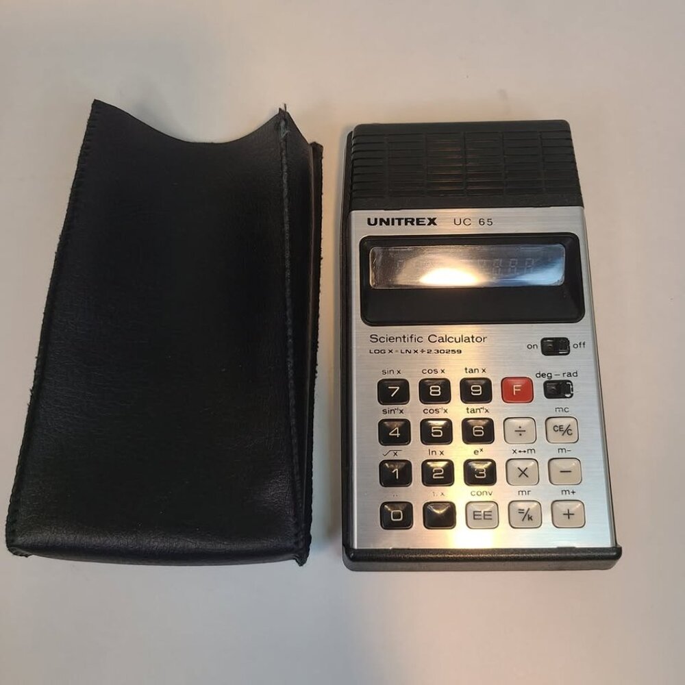 Vintage Unitrex UC 65 calculator. Nice Rare Vintage Scientific Calculator